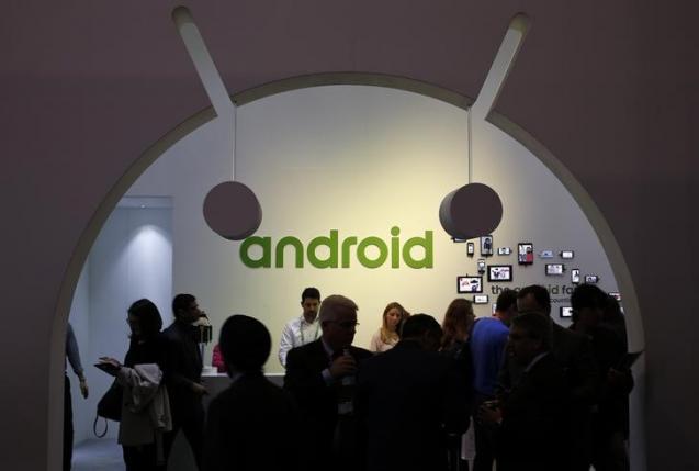 People visit an Android stand at the Mobile World Congress in Barcelona March 4, 2015. REUTERS/Gustau Nacarino